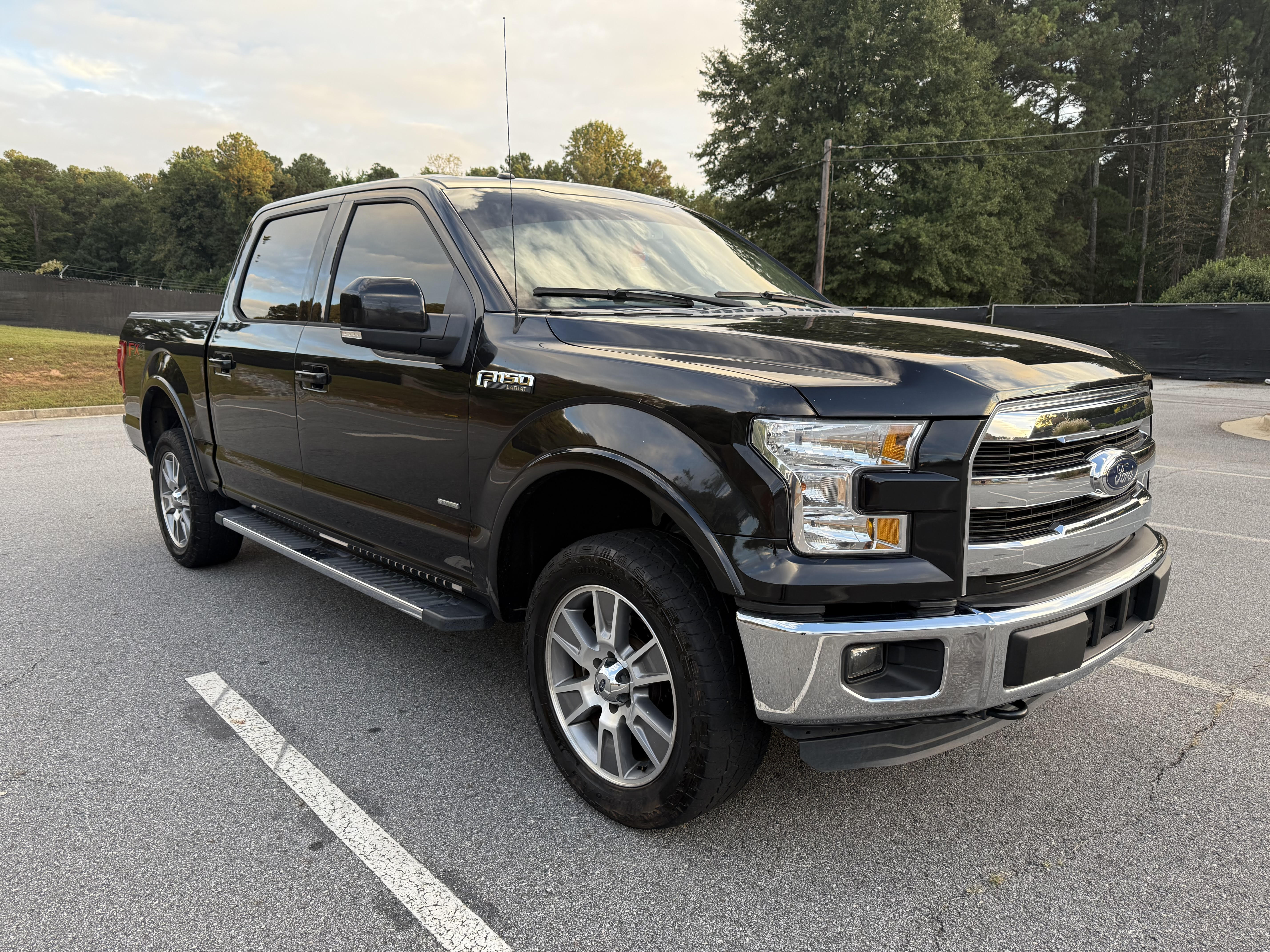 2015 Ford F-150 crew cab Lariat 4x4 3.5L ecoboost, Black for sale in Douglasville, GA — photo 1 of 12