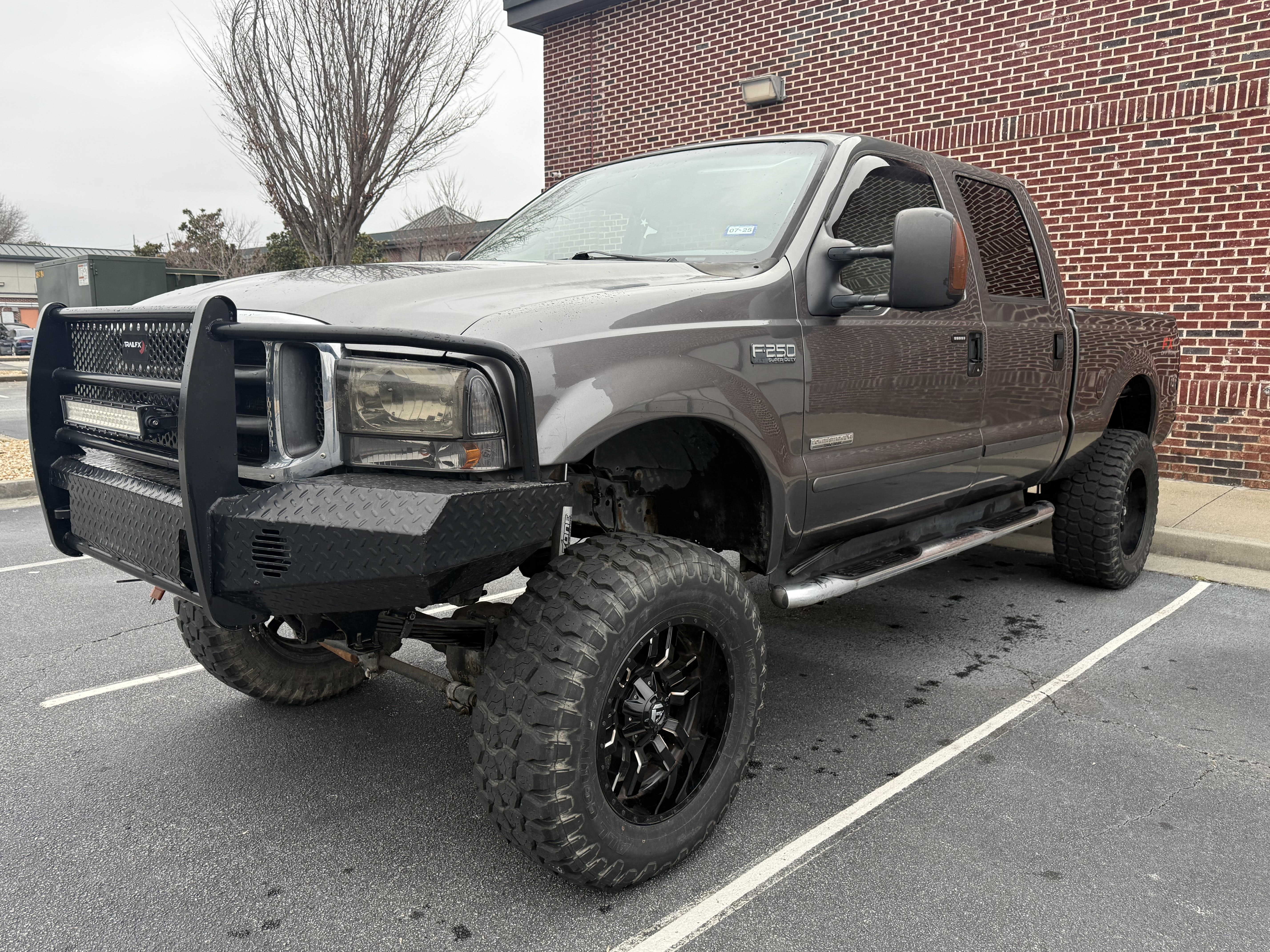 2004 Ford F-250 super duty crew cab 4x4, Gray for sale in Douglasville, GA — photo 1 of 10
